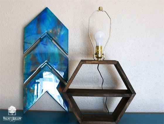 Assemble and wire your lamp kit, attach to the hexagon shelves, and add a lightbulb